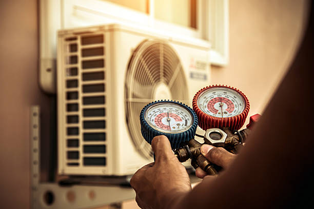 Professional Hvac technician working in Newfields, NH